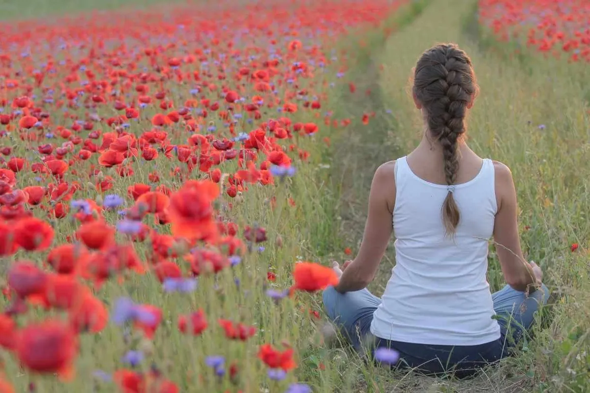 Woman practicing yoga in a calm, focused setting
